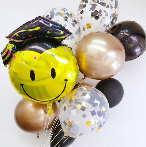 Bouquet CARITA FELIZ CHICA DE GRADUACIÓN